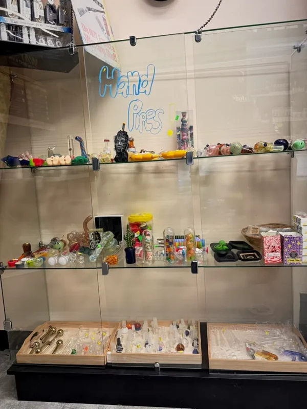 Glass hand pipes in a display case