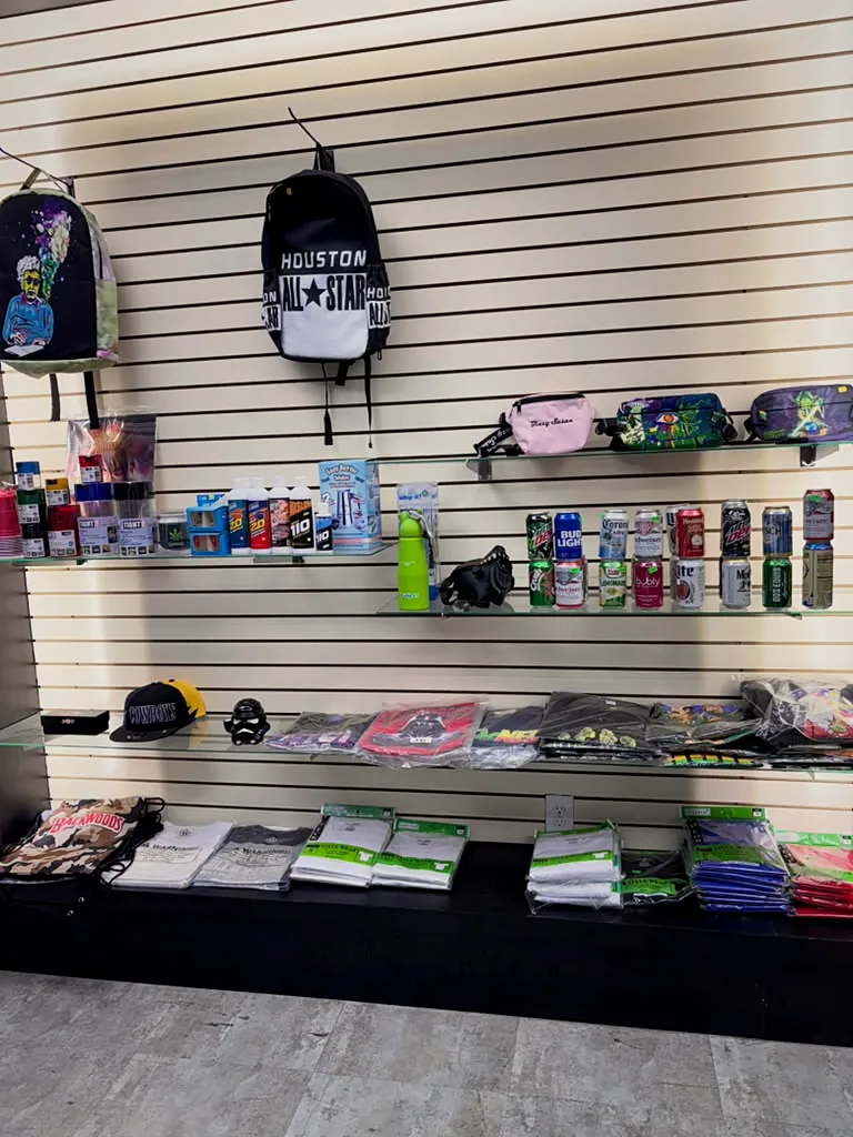 Accessories, bags and apparel wall at Way~Up Smoke