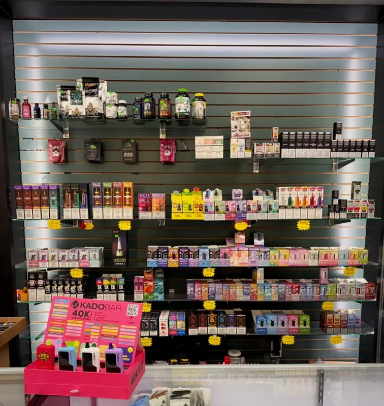 Wall of disposable vapes at Way~Up Smoke Houston