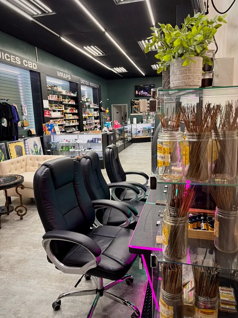 Inside Way~Up Smoke Houston with display cases and seating
